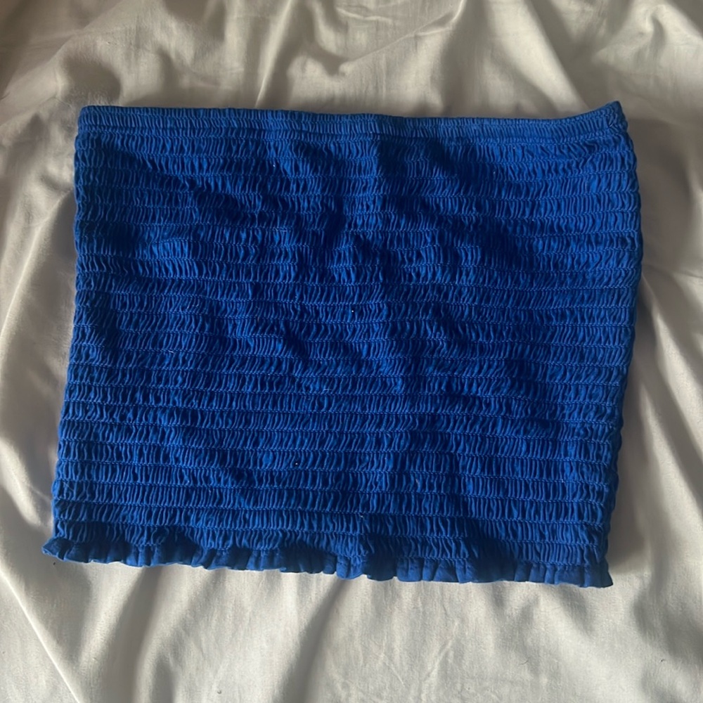 Express size Medium but could fit like a small. barely worn just like new